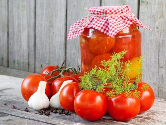 Photo of tomatoes in jars